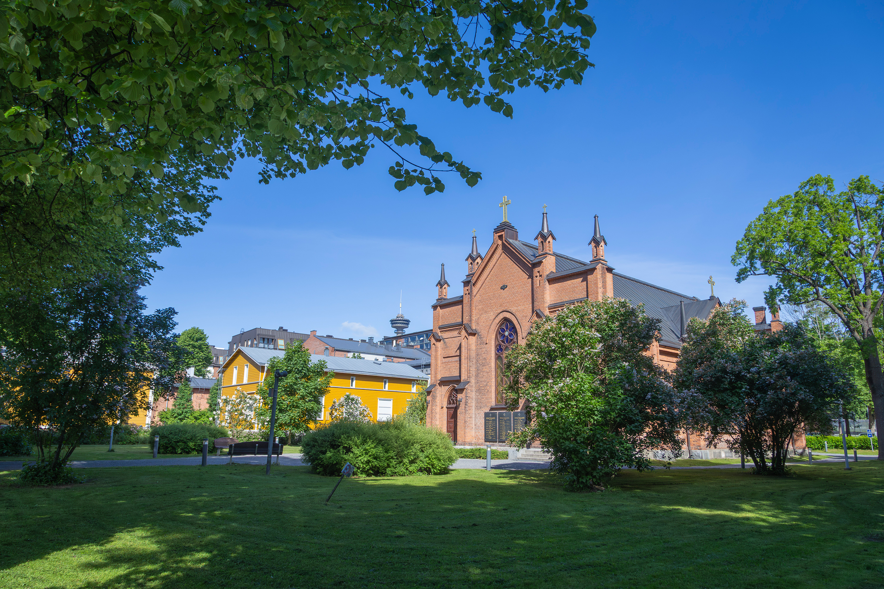 The façade of Finlayson Church is impressive. The church is a new Gothic style building constructed from red brick.